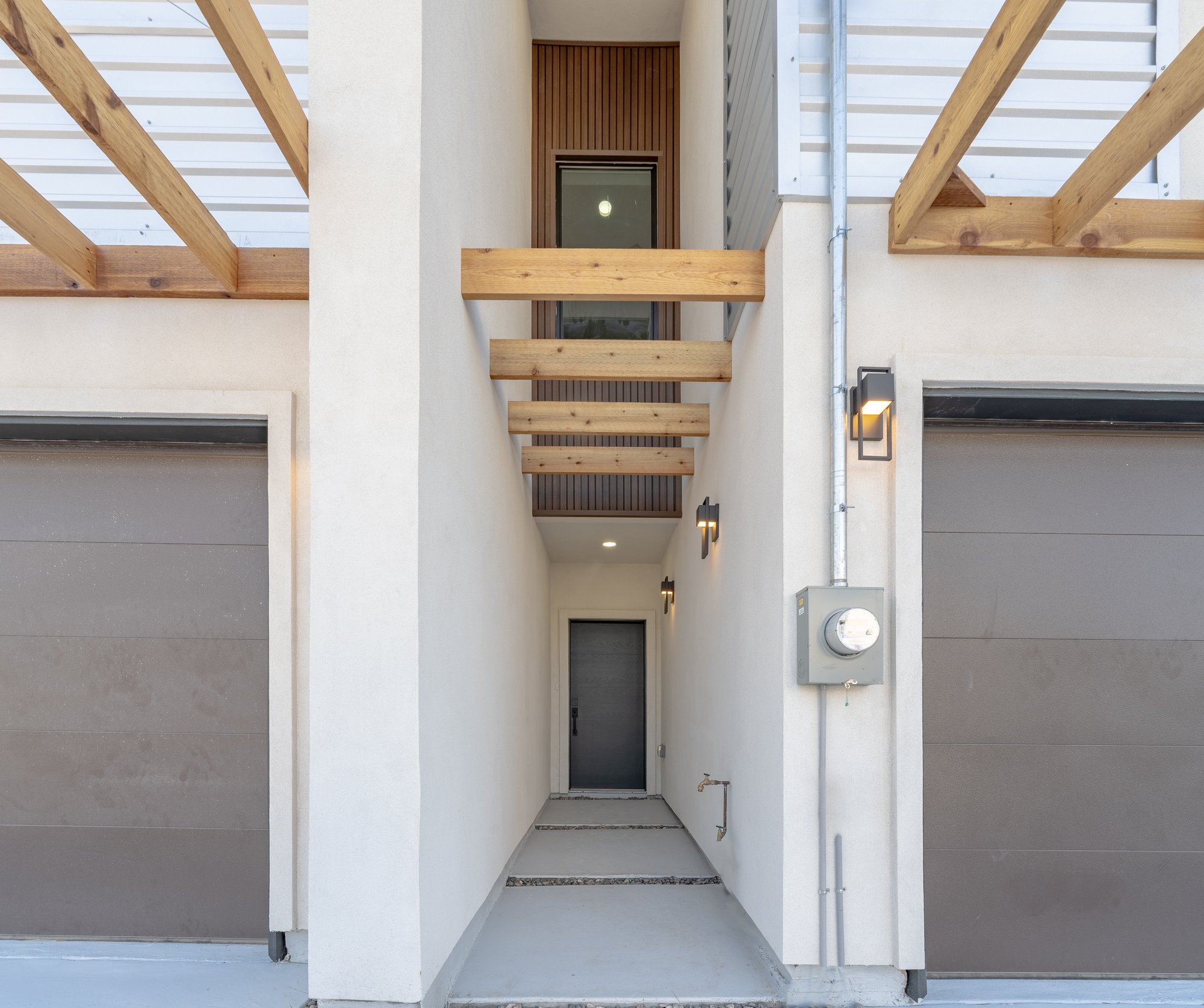 Three Sisters · twin entry corridor between units